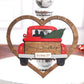 Handcrafted wooden "From Our First Kiss to Our Last Breath" ornament featuring a vintage red truck with a Christmas tree, framed in a heart, perfect for holiday décor and a romantic gift.