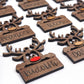 Handcrafted wooden Reindeer Name Tag Ornaments Set featuring Santa’s reindeer names and playful designs, perfect for holiday décor and gift-giving.