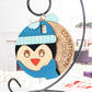 Handcrafted wooden Penguin Countdown to Christmas ornament featuring an adorable penguin with a winter hat and scarf, perfect for holiday décor and adding excitement to the Christmas season.