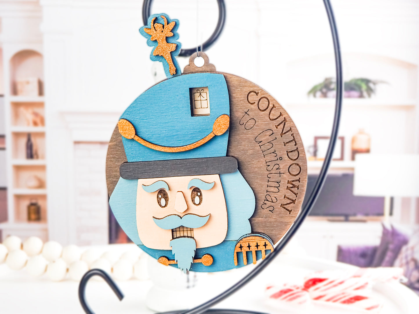 Handcrafted wooden Countdown to Christmas ornament featuring a charming nutcracker design with a movable Sugar Plum Fairy, perfect for holiday décor and adding excitement to the Christmas season.