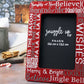 Deep red 4-inch by 6-inch picture frame. In silver and white writing, words are displayed on the frame; Santa & Me, Merry & Bright, Jingle Bells and a few more Christmas phrases. Handmade by Snuggle Up Co