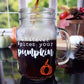 Clear glass mason jar-style mug with a handle. The mug features white text that reads "Whatever spices your pumpkin," along with an orange pumpkin graphic at the bottom.